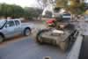 The M3A1 Stuart driven by the owner Todd Vail moving from the airport to the forming up place in town prior to the parade. This vehicle suffered a rollover when loading, but with some care was back in action for the  rally . 