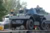The Canadian Lynx Scout Car of the Australian Army Tank Museum, being unloaded at the Corowa airport. It is marked as a vehicle belonging to the 1st Australian Armoured Car Squadron serving with BCOF Japan. 